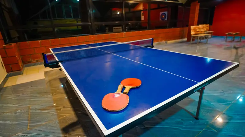 A table tennis table with two bats