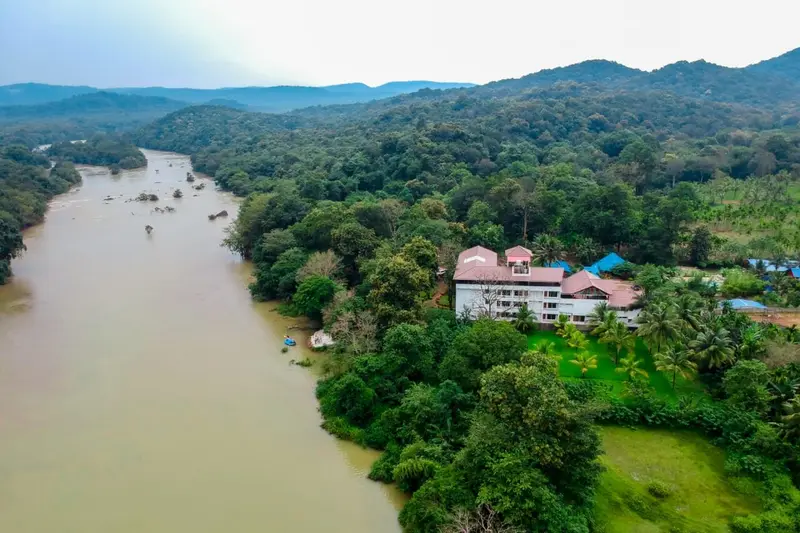 The resort and the Kali River from above